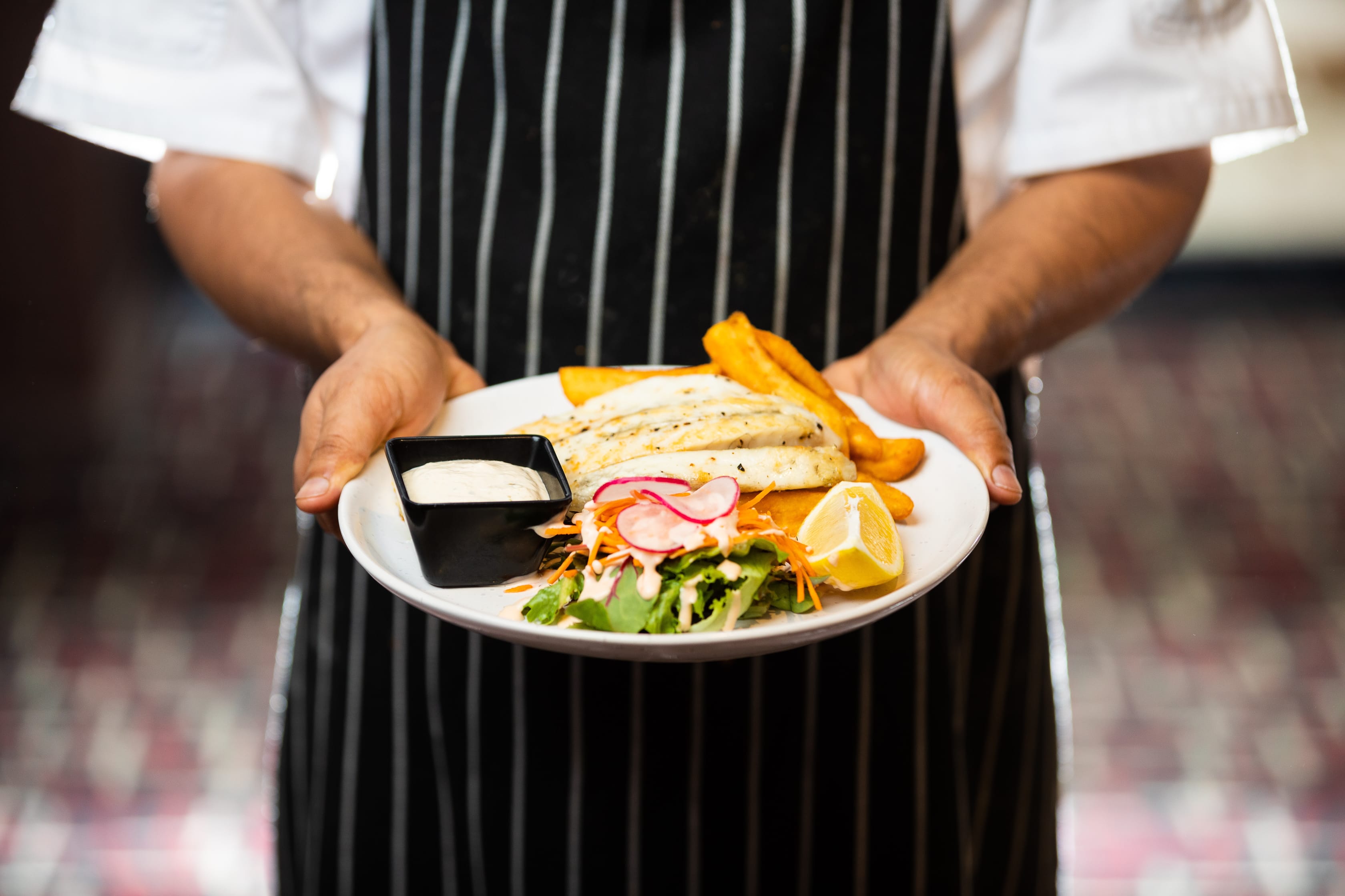 image showing a chef preparing food