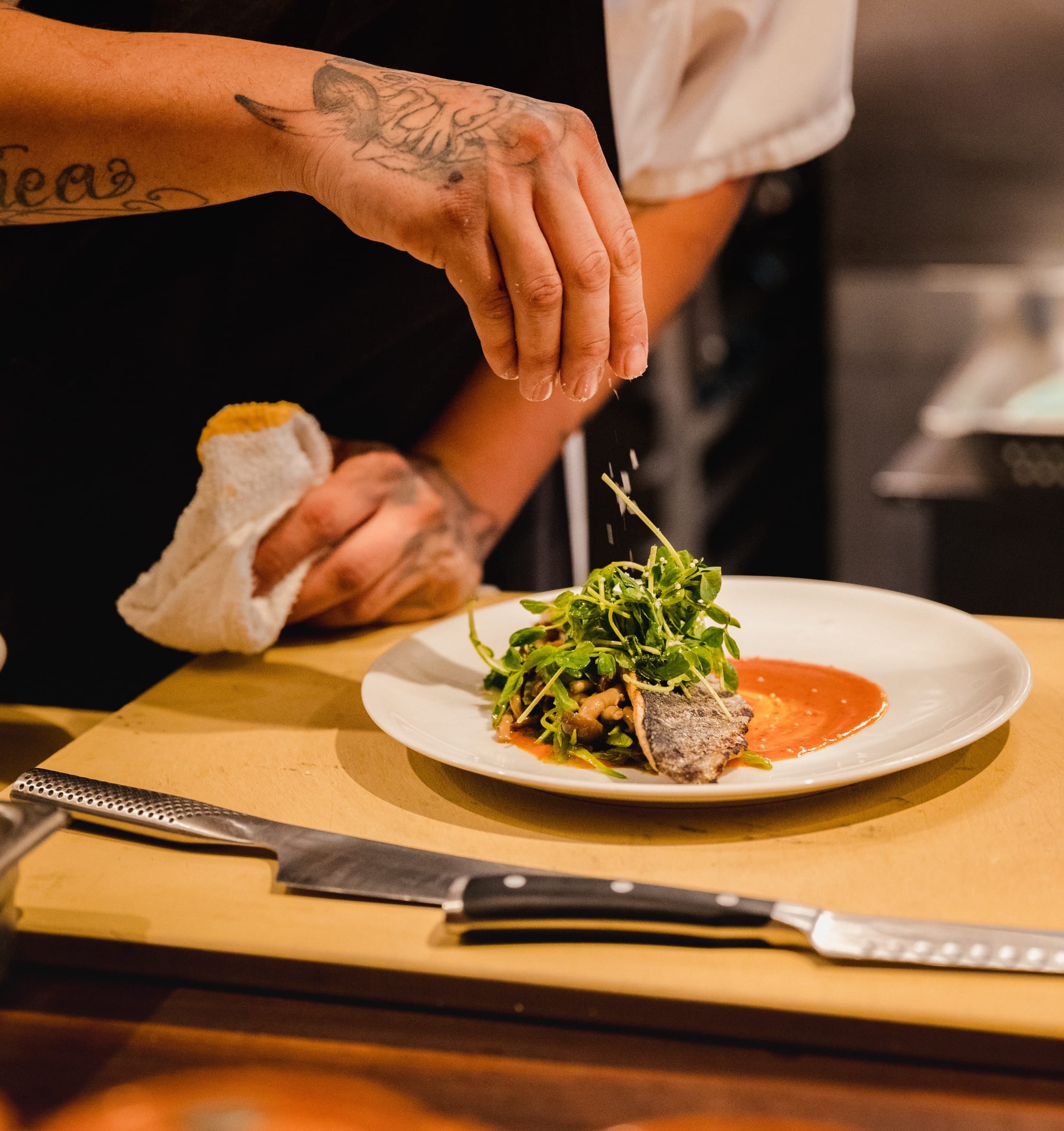 image showing someone holding a plate of food